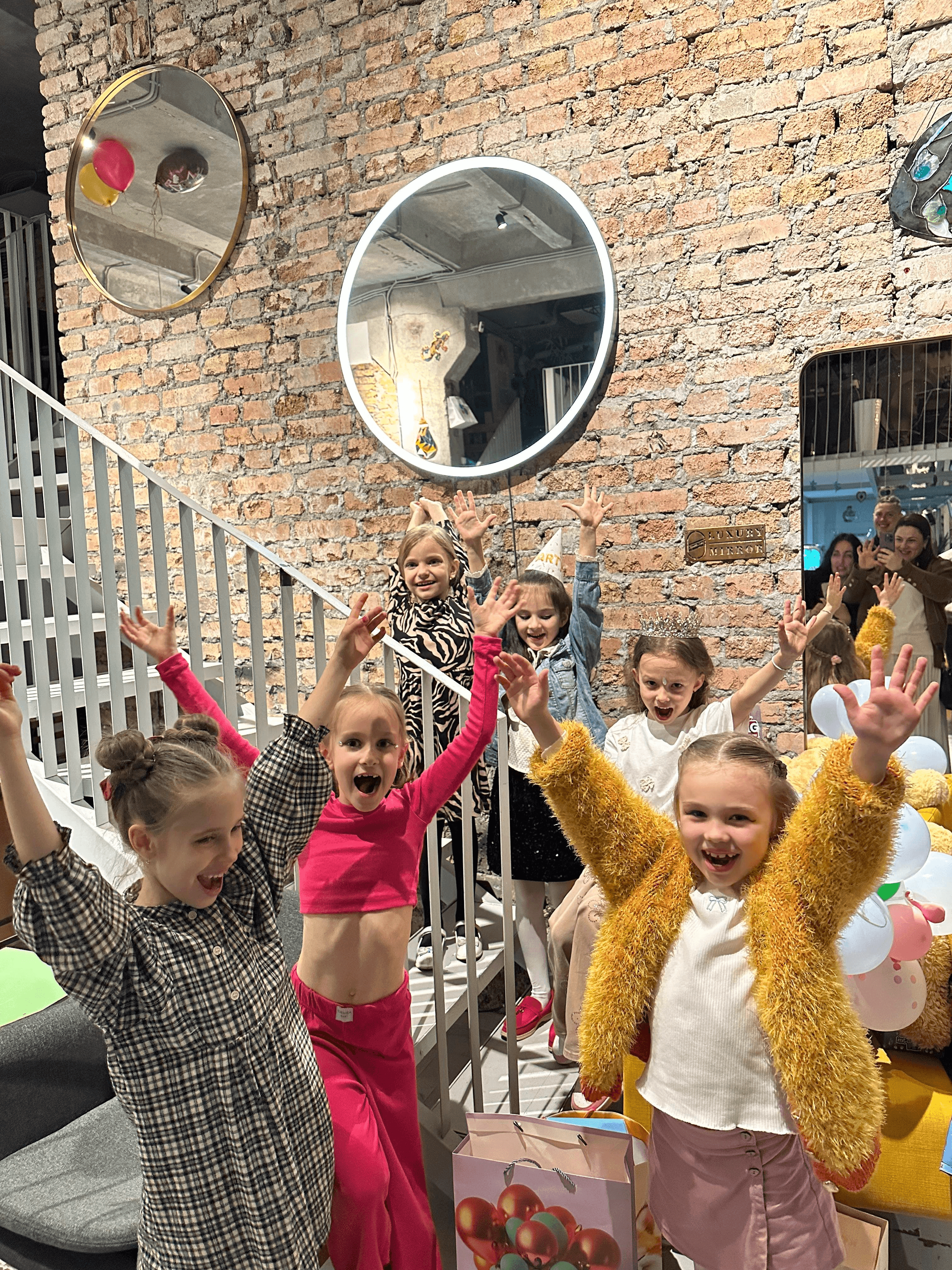 A man stading with Surfboard